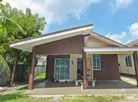 OYO 90596 Casaria Inn