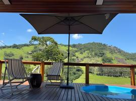 Aura dos Ipês - Chalé nas Montanhas de Gonçalves, Hotel in Gonçalves