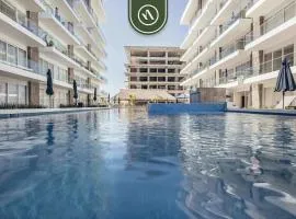 New 2 BR Condo One Street From Beach - Pool - Gym