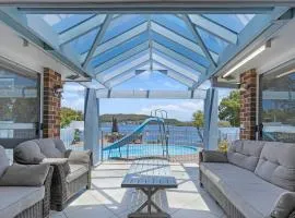 Waterfront Home with Pool Slide