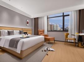 君羊酒店阿克苏金兰广场老街夜市店, hotel u Aksuu