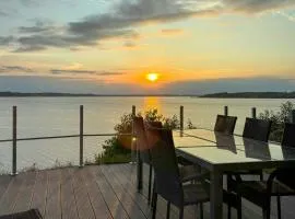 Familiehus Med Solnedgange Ved Hjarbæk Fjord