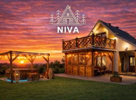 Domek NIVA z Jacuzzi i Widokiem na Zalew, hotel v mestu Nawóz
