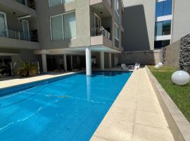 Monoambiente con piscina y parrilla, hotel a Vicente López