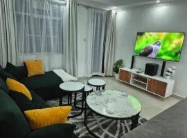 CM Snug stay -Naivegas Apartments
