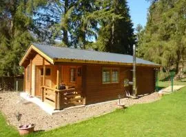 Holiday Home Holz-Blockhaus für vier Personen mit Terrasse by Interhome