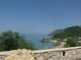 Studio Apartments with large swimming pool and Sea view at Pelekas Beach, Corfu