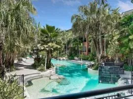 Tropical Resort with balcony overlooking pool