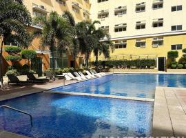 Cozy Condo in Holland Park Southwoods With Pool, hotel em Biñan