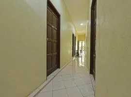 OYO 90596 Casaria Inn