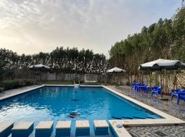 مجموعة سعادة الترفيهية بالريف الاوروبي، فندق في ‘Ezbet Sharikât Wardan