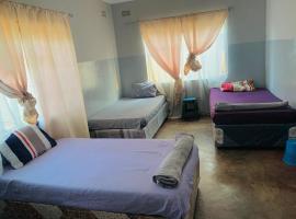 Sunshine Guest House, alojamiento en Binga