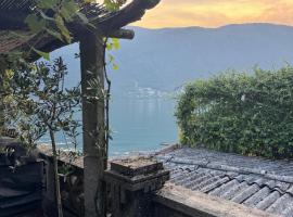 VILLA MORCOTE - Exclusive Lakefront Villa Lago di Lugano, מלון במורקוטה