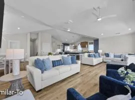 Stunning new build home with shared pool and private hot tub, close to beach