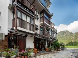 Castle peak yard Inn Free railway st ation pick-up by 2 nights, hotel v destinaci Kuej-lin