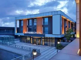 Crystal Hotel Shanghai University Dachang