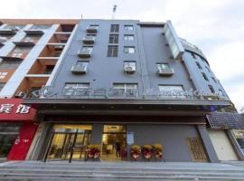 Magnotel Business Xuzhou Feng County Bus Station, отель в городе Feng