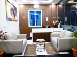 Deva Towers, hotel en Puttaparti