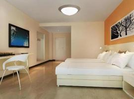 7 Days Inn Aksu Airport, hotelli kohteessa Wensu