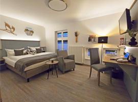 阿蒙市場及啤酒屋斯特庫酒店，烏埃克爾明德的飯店