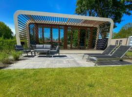 Viesnīca Bad Hoophuizen Chalet Deluxe mit Zaun Nr Zuiderzee 66 pilsētā Hulshorst