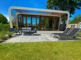 Bad Hoophuizen Chalet Deluxe mit Zaun Nr Zuiderzee 66