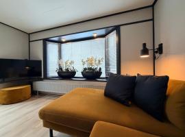 Gezellig chalet met 2 slaapkamers aan bosrand, chalet in Erm