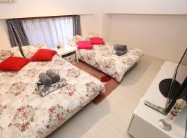Takemura Building 103, hotel en Wada