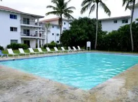 Peaceful 2BR Retreat with Pool, Paddle Court & Private Beach Access