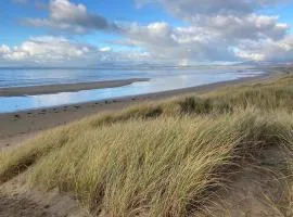 Harlech castle and beach home