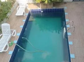 Espaço de lazer com suite