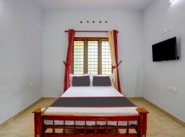 Hotel O B&B Rooms: Kollam şehrinde bir otel