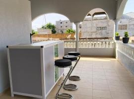 azimmo, hotel u gradu 'Komé'
