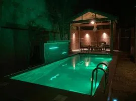 Tekrour- la case des hôtes- Suite privée-chambre, salon et cuisine complete