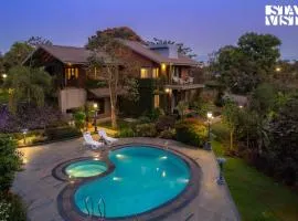 StayVista at Brickhouse Aranya with Pool and Farm View