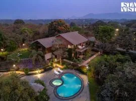 StayVista at Brickhouse Aranya with Pool and Farm View