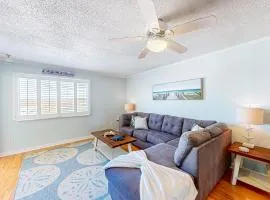 Water view home with nautical theme, open layout, central air, W/D, and patio