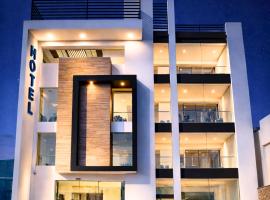 Hotel Vía Norte Inn - Premium con Estacionamiento y acceso rápido al Periférico, hotel em Tuxtla Gutiérrez