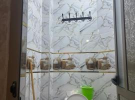 Airport house break, hotel di Ikhorbane