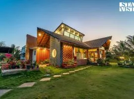StayVista at Vafa Acres with BBQ & Jacuzzi