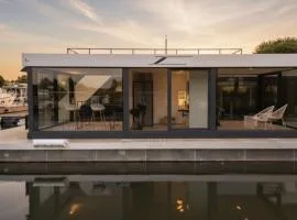 Luxus Hausboot - Exklusives Wohnen auf dem Wasser