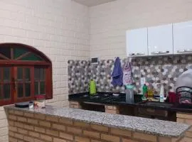 Casa Hum com cozinha americana