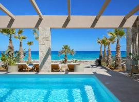 Sabbia Mare BeachFront Villa, steps from Dining & Shops, By ThinkVilla, hotel u gradu Anissaras