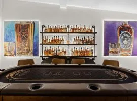Bourbon-themed home w arcade & hot tub for groups
