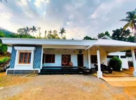 2BR Homestay near Thooval Waterfalls by Sapovnela