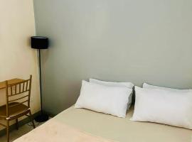Banezville 1 Host Homes Tacloban, hotel en Sagcahan