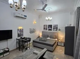 Elegant Grey Studio Room with Free Parking and Gaming