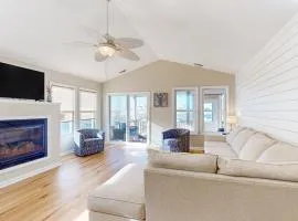 Sound front duplex with enclosed yard, gazebo, dock and ultimate sunset views!