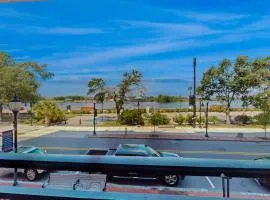 Condo w/ Private Balcony & Lovely River Views in Walkable Locale