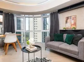 Central BGC 2br loft Corner unit with stunning views